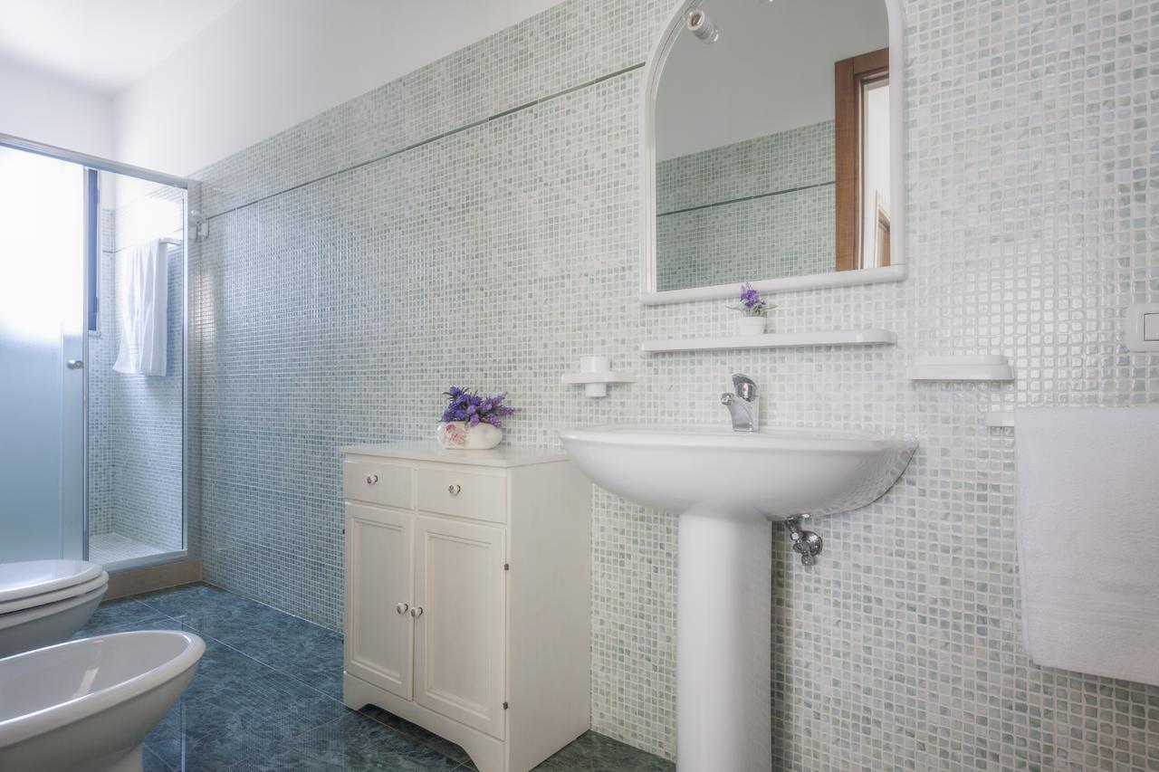Attico Saker Apartment Racale Bagian luar foto